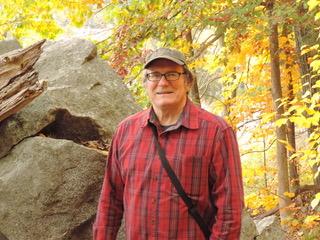 man in red plaid shirt