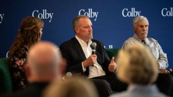 steven michaud speaks during a panel event