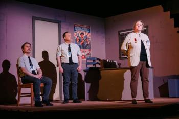 Three actors on stage