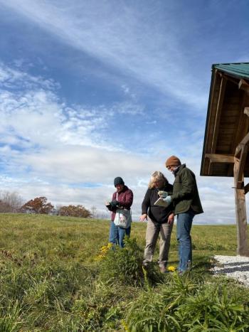 standing with notebooks