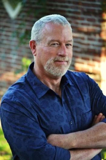 John David Adams wearing blue shirt