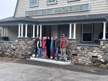 staff under Down East Magazine porch sign