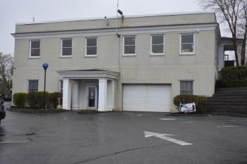 Police station building entrance, no vehicles
