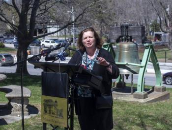 Laura Fortman at lectern