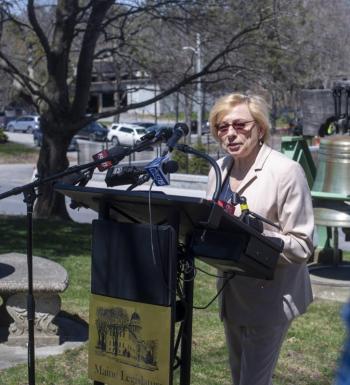 Governor Mills at lectern