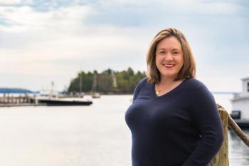 woman with harbor backdrop