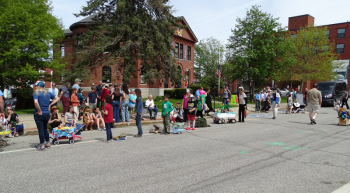 People line up for the second annual Petit Rex parade. (photo by Erica Thoms)