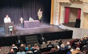 Reverend Seongmoon Ahn delivers the opening remarks at Arthur Crockett's Celebration of Life, May 9