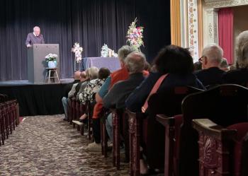 Opera House Manager Dave Morrison delivers Crockett's eulogy.
