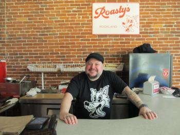 Sean Williams, Portland Roasty's manager, came up all winter to serve on his days off. The pop-up is in Main Street Markets' gallery space. Photo by Kay Stephens