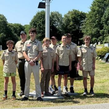 group photo at flag pole
