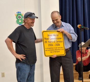 Town Administrator James Kossuth hands plaque to Amon Morse. (photo by Erica Thoms)