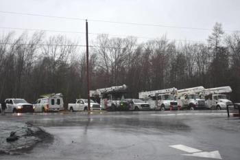 power trucks staging in a parking lot.