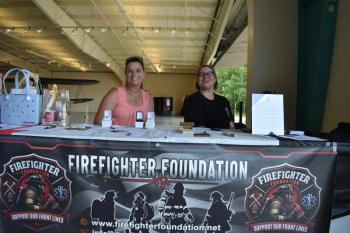 two women at display table