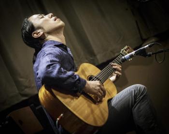 person playing guitar