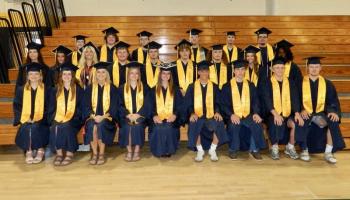 larger group photo with all yellow sashes