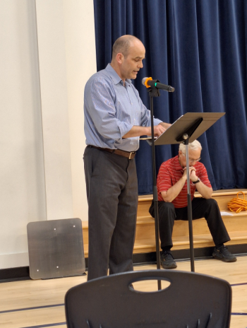 Town Administrator James Kossuth addresses the crowd. (photo by Erica Thoms)
