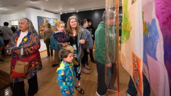 visitors view art displays