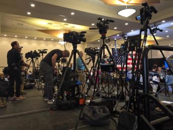 Media swarm (Photo by Michael Hurley)