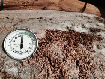 thermometer on rock