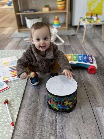 toddler with drum