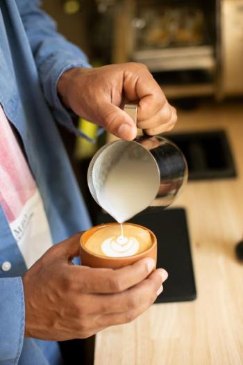 Pouring a flat white. Photo courtesy Marcel Pardoa