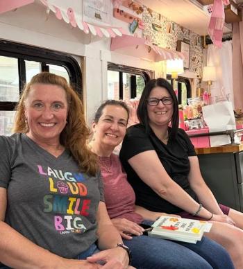 Read Between the Spines Book Club members: Meesh Preston Maureen Petone and Tarsha Richmond on the bus. Photo courtesy Meesh Preston