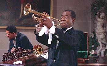 man plays trumpet