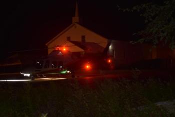 helicopter in church parking lot