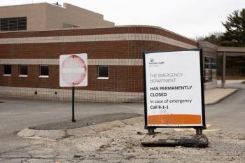 sign noting the hospital is permanently closed