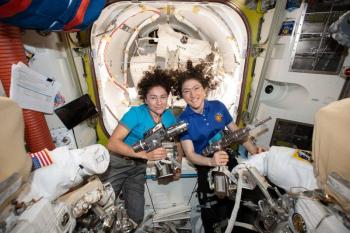 two females inside airlock