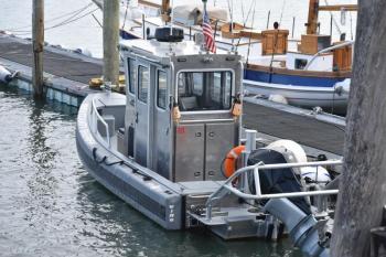 boat tied to dock