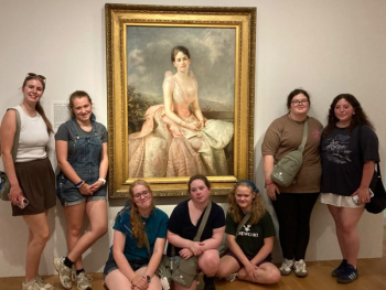 girls pose around portrait