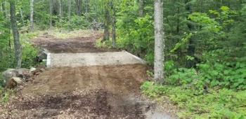 dirt road over a stream