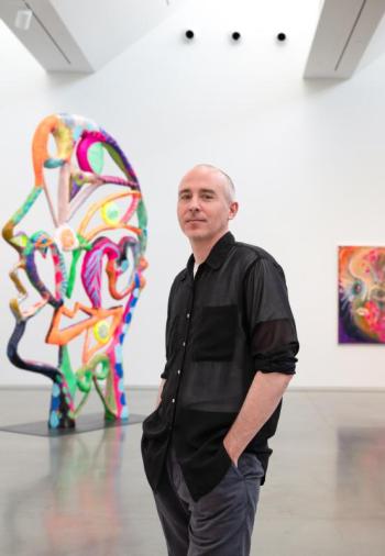 man in art gallery