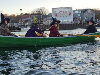four witches in a boat