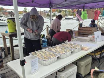 Non-stop shucking for more than 1,000 people. Photo by Kay Stephens