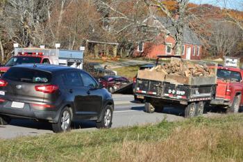 car being pulled out of ditch