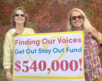 two women with presentation check