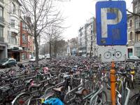Overflow bicycle parking next to the train station in Ghent. (Photo by Ari Snider)