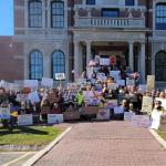 Photographer Christy Benoit gathered participants on the Knox County Court House steps for a photo after the No Kings Protest in Rockland
