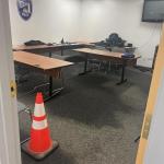 safety cone marks a water-soaked carpet