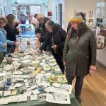 Browsing the free seed packets from last year. Photo courtesy Rockport Public Library