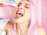 Girl eating nerds candy