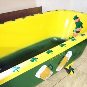 The "Irish Tub," a cast iron clawfoot colorfully refinished by Coughlin with help from a local artist. (Photo by Ethan Andrews)