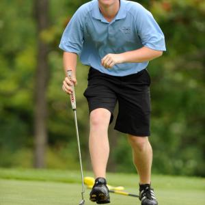 Oceanside's Nick Mazurek checks out a putt on the third hole of the par 37 Rockland Golf Club Tuesday, Aug. 28 during the match with Gardiner. Oceanside won 6-3. Photo by Ron Hawkes