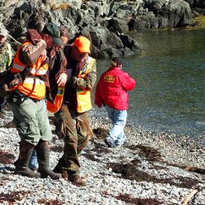Knox and Waldo counties Emergency Management Agencies conducted a mass casualty drill on Lasell Island, in Penobscot Bay, Oct. 13. The scenario involved a downed 16-passenger aircraft with 15 people unaccounted for. Midcoast and Waldo County Search and Rescue crews were dispatched to the island to find the 'victims' and render aid for a variety of hypothetical injuries and life-threatening conditions. (Photo by Holly S. Edwards)