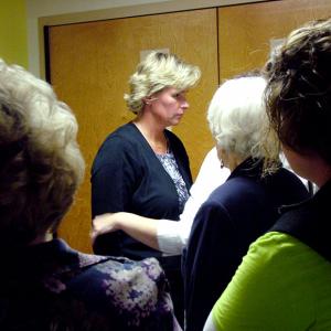 Mount View Middle School teacher Eileen Ellis, center, with supporters during a break in a closed door session of the RSU 3 school board on Sept. 10 at which grievances filed in the spring by she and another teacher were denied. A week later both grievances were quietly resolved. (Photo by Ethan Andrews) Mount View Middle School teacher Eileen Ellis