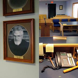 In the Waldo County Probate Court. Left: a portrait of challenger Randy Mailloux during a previous term as probate judge from 1997-2004. Right: Presiding Waldo County Judge of Probate Susan Longley's view from the bench. (Photos by Ethan Andrews)