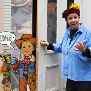 Mary Weaver opens the door to the attic stairs of her barn in Belfast where hundreds of costumes and props for the annual Church Street Festival parade reside. This year's festival is this Saturday, Oct. 6. Weaver seeks children and their parents to participate and put the props to good use. (Photo illustration by Ethan Andrews)